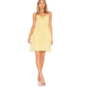 Endless Rose “Shirred Slip Dress” in Yellow.
